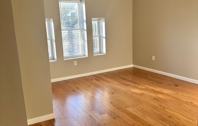 Newly Renovated, Spacious Home for Rent! Large Rooms with Beautiful Hardwood Flooring Throughout! W/D! Central Air! Fenced in Yard! Available Now!