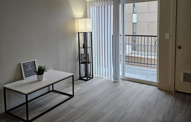 interior photo of a living area with a sliding glass door from The Lotus Apartments in Downtown Salt Lake City, Utah