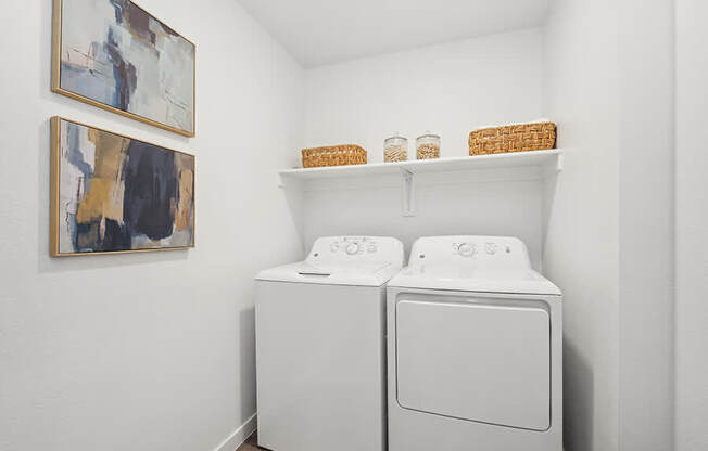 Model Laundry Room with Washer & Dryer at Glen 91 Apartments located in Glendale, AZ.