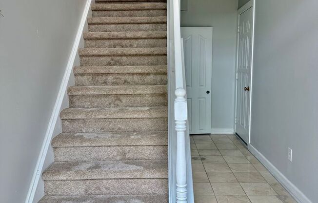 3BD/2.5BA Brick Townhouse in Chancellors Walk! New Flooring & New Paint Throughout!