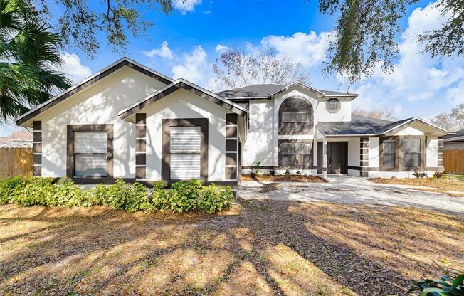 Beautifully Renovated 4/2.5 Pool Home with Full Service Pool Care Included in the Desirable Dr. Phillips Area - Orlando!