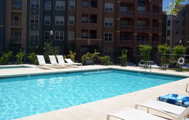 Upgraded 4th floor unit in upscale guard gated community just South of the Strip