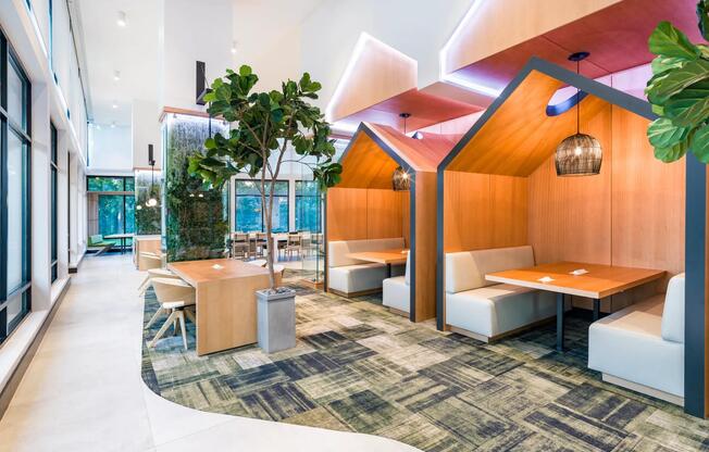 Flexible workspaces with private pods and collaborative seating offer a stylish, functional escape for work or leisure.