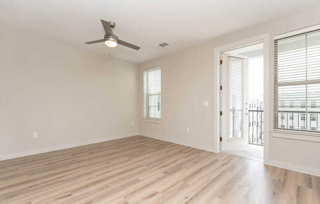 Living Room with Balcony and Hard Surface Flooring