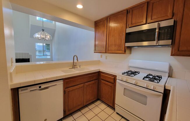 Top Floor Penthouse Loft Condo | Fireplace | Laminate Flooring | Community Swimming Pool