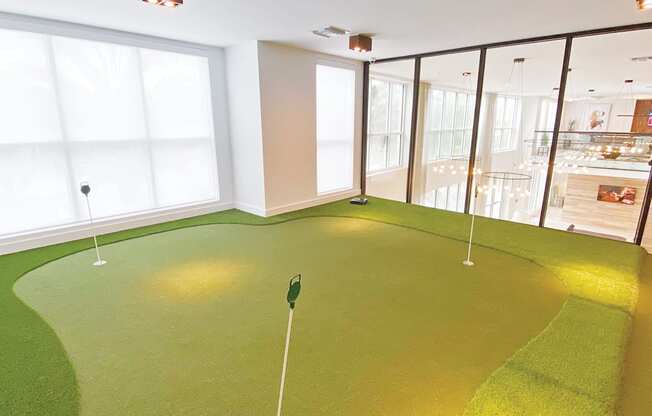 Virtual golf with putting green