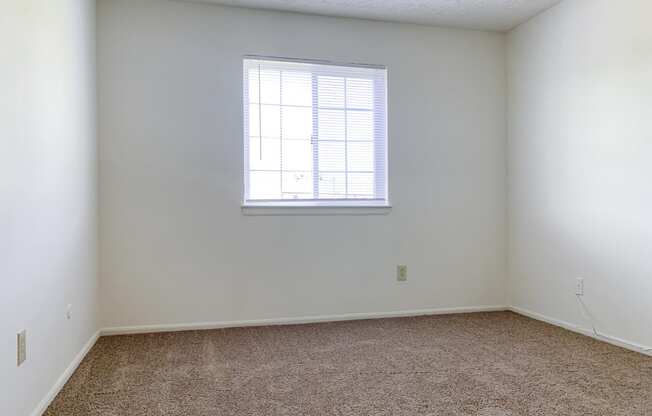 Large bedroom at Waterstone Place Apartments in Indianapolis, IN 46229