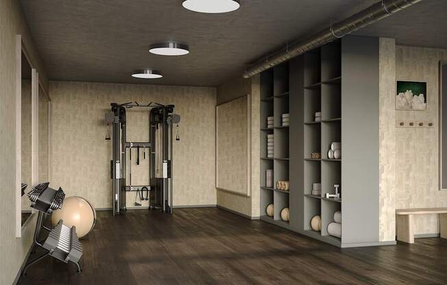 A gym with a weightlifting area and a bench.