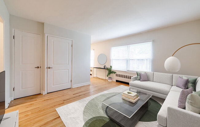 a living room with a couch and a coffee table