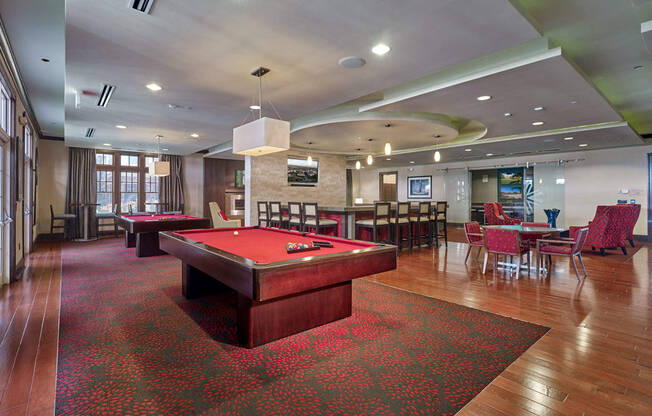 A room with a pool table and a red carpet at Vermella Lyndhurst apartments, Lyndhurst