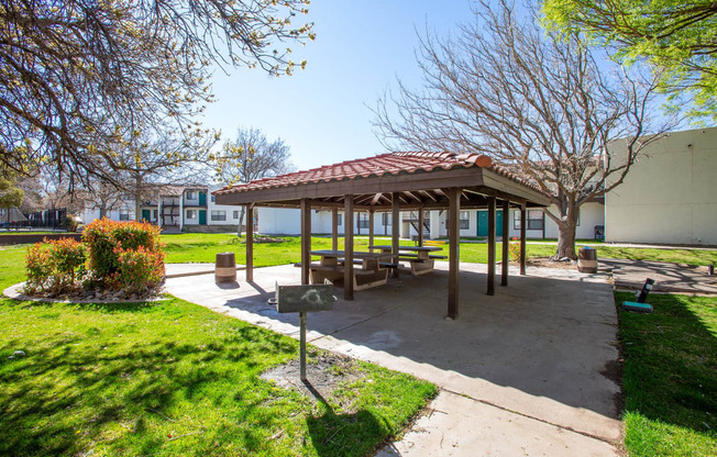 BBQ Grill Area at Whispering Sands Apartments in Albuquerque