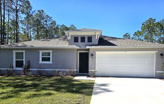 $1,000 OFF 1ST MONTHS RENT***STUNNING 3/2 HOME IN PALM COAST