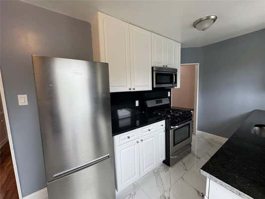 153 32 77 AVE