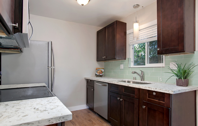 This is a must see!   With AC! and Pvt Patio(Downstairs Unit) EV Chargers!