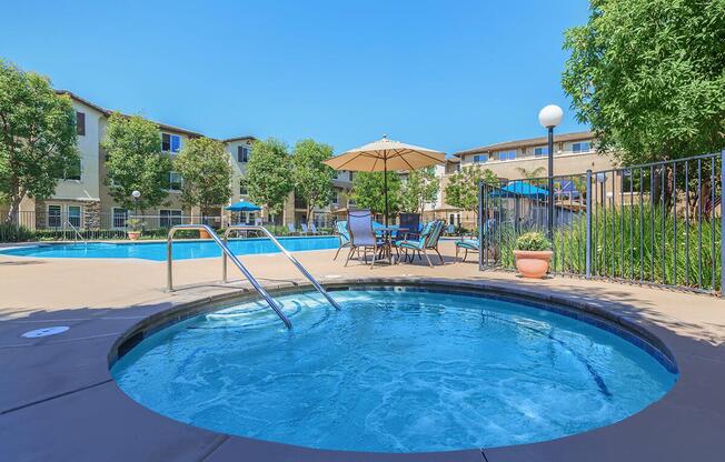 a group of people swimming in a pool of water