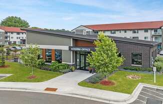 a view of the leasing office from the parking lot