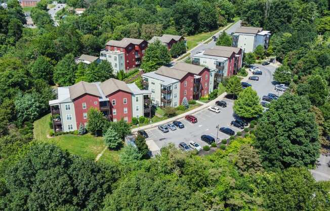 an aerial view of a row of houses and a parking lot at River Mill Lofts & Skyloft, Asheville, NC 28803