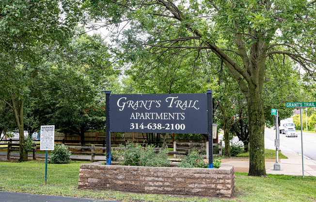 a sign that says greats trail apartments