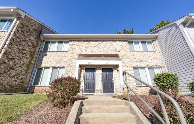 Apartment building exterior at Woodbridge Apartments Bloomington