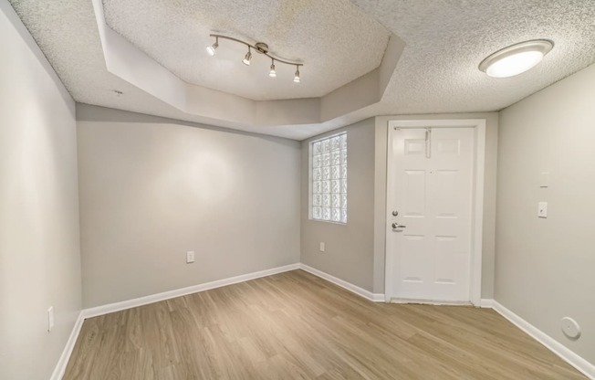 Dini groom area with wood style floors at Pembroke Pines Landings, Pembroke Pines, FL, 33025
