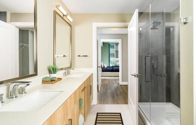 A refined primary bath at Modera McGavock, featuring clean lines, generous storage, and a calming retreat with Nashville just minutes away.