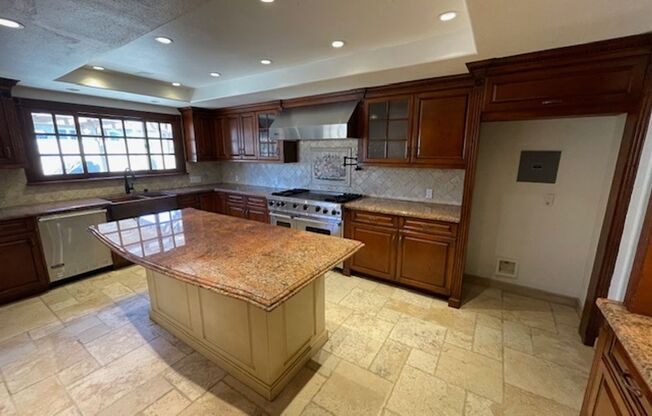 Spacious 4 Bedroom Oxnard Home with Custom Kitchen and More