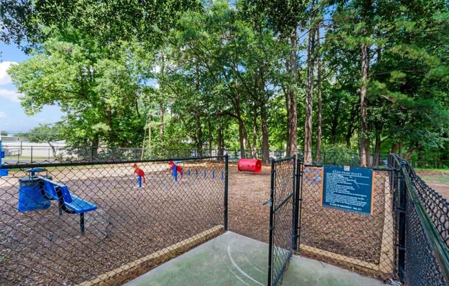 our apartments showcase a dog park with a playground