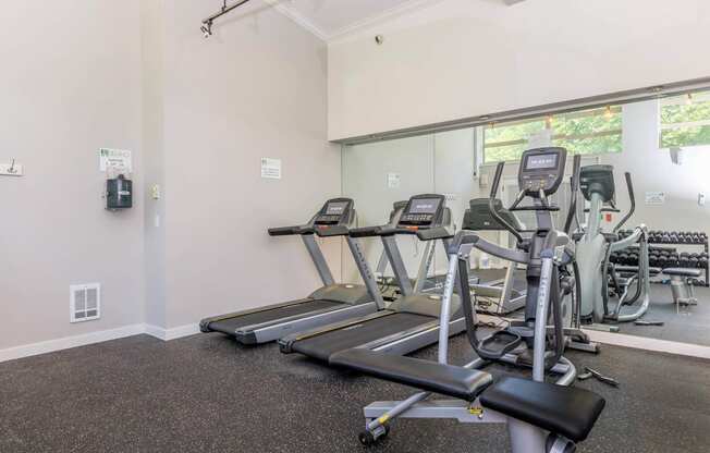 the gym at the flats at big tex apartments  at Delano, Redmond