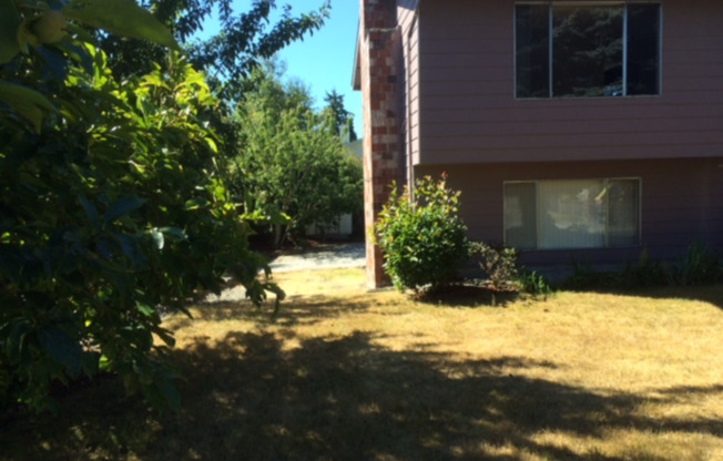 Spacious 4 Bed 3 Bath Kirkland Home with Attached Garage and Large Yard!