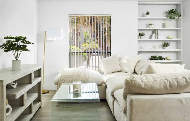 a living room with a couch and a coffee table