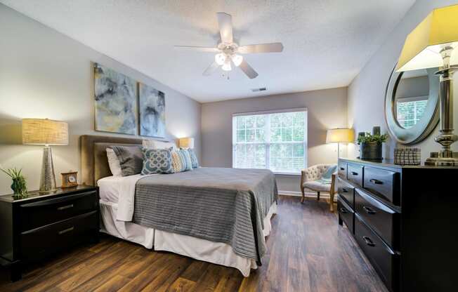 Spacious Bedroom with Queen Bed, Nightstands, Dresser and Corner Chair