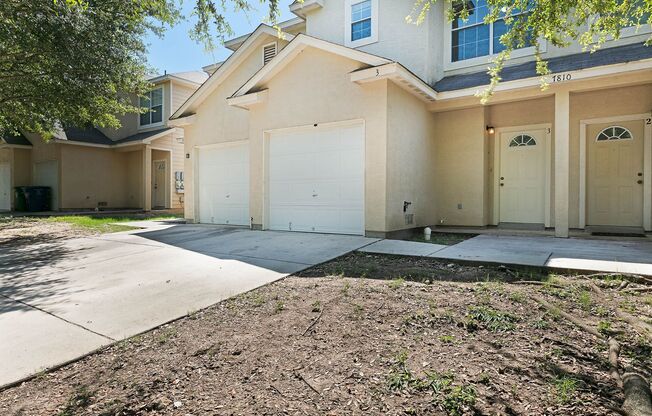 3 bdrm 2.5 Bath~Beautiful townhouse with stained concrete flooring downstairs! Rare End Unit