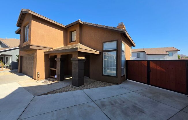 Welcome to Three Bedroom, Two in a half bath in Perris, CA!