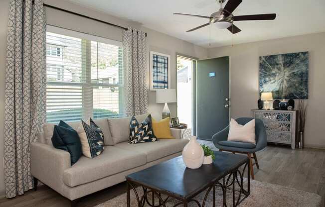 a living room with a couch and a coffee table