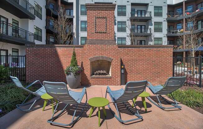 Poolside Fireplace with Lounge Chairs at Windsor Parkview, 5070 Peachtree Boulevard, Chamblee