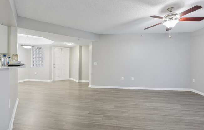 an empty living room with a ceiling fan at Pembroke Pines Landings, Pembroke Pines, FL 33025