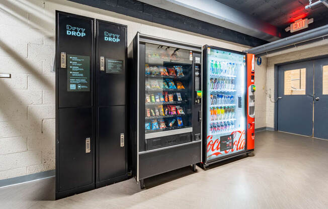 a row of vending machines in front of a door