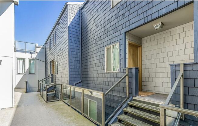 Stunning Sand Point Condo with Loft and Balcony