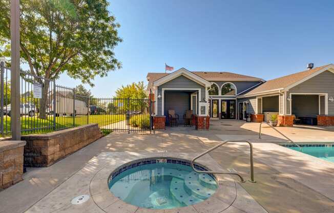 our apartments have a pool and a patio with a house