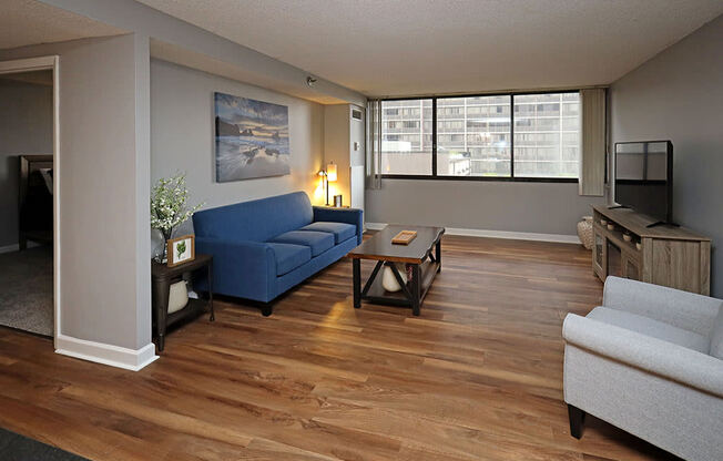 Newly Renovated Model Suite at Reserve Square in Cleveland OH - Living Area with Brand New Hard Surface Flooring