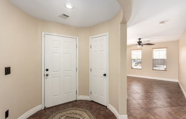 **FREE RENT THRU 6-30-25 FOR QUALIFIED APPLICANTS WITH IMMEDIATE MOVE IN**Perfectly situated large 4 bedroom southwest home
