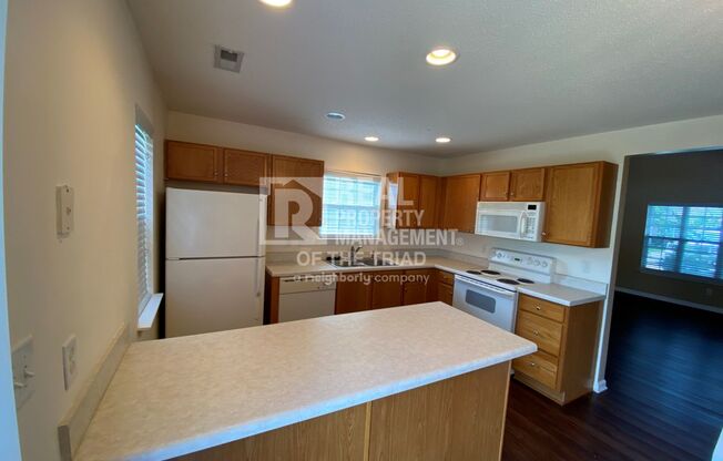 Spacious 3BR/2.5BA End Unit Townhome in Whitsett Available Now!