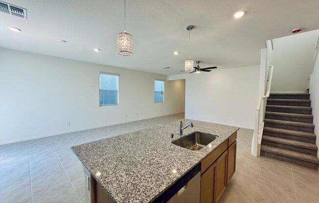 Brand new home in Saguaro Ranch community with a full bed & bath downstairs!