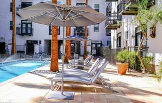 poolside lounging area at Roosevelt Square apartments