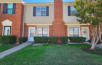 Stunning two-level, two-bedroom, one-and-a-half-bathroom townhome