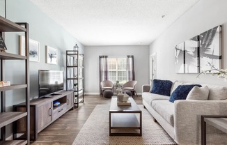 St. Ives Crossing apartments in Stockbridge Georgia photo of living room with hardwood flooring