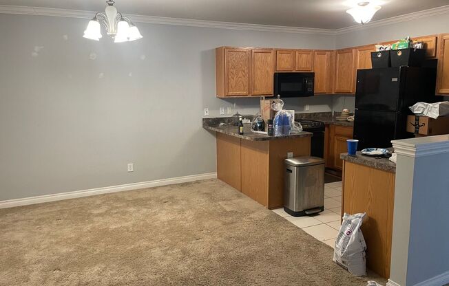 2 master suites with walkin closets, single car attached garage