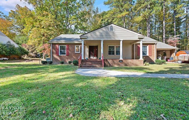 Spacious brick ranch in the heart of Louisburg!