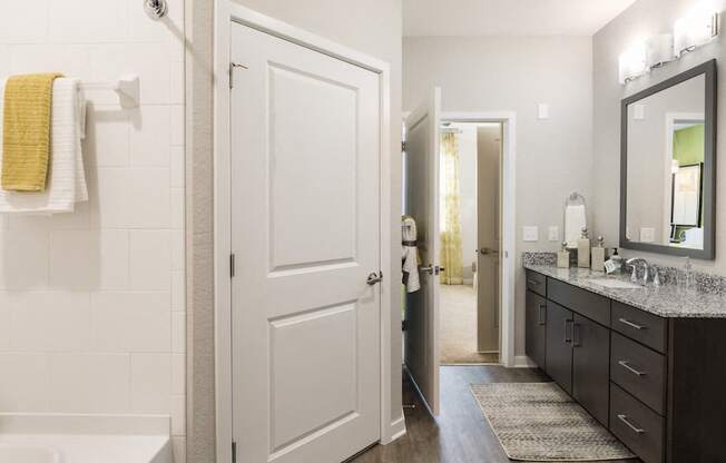 large bathroom with spacious granite  vanity