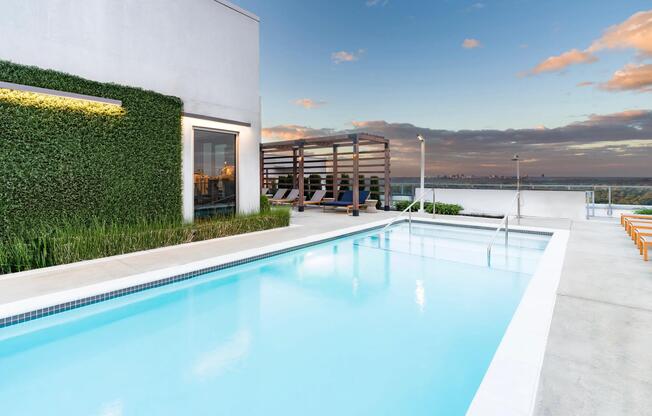 Rooftop pool days at Modera Old Ivy feature open skyline views, cabana-style seating, and a calm escape overlooking Atlanta.